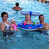 Swimming with Mom, Camryn, and Uncle Mike.  My hat is so lame.<br><div class='photoDatesPopup'><br>from Emily's Photos taken 8/19/2005 and posted 8/27/2005</div>