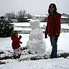 We worked so hard and our snowman looks so pathetic.  Give me some sand and see what I can do.  <br><div class='photoDatesPopup'><br>from Emily's Photos taken 1/21/2007 and posted 2/16/2007</div>