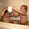 My Cousin Cami helped me rinse the soap off of my head.<br><div class='photoDatesPopup'><br>from Emily's Photos taken 3/3/2007 and posted 3/23/2007</div>