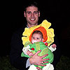 Dad is holding me.  When he handed me to Mom, he told her that he picked this flower just for her.<br><div class='photoDatesPopup'><br>from Emily's Photos taken 10/31/2005 and posted 10/31/2005</div>