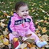 Sitting in a pile of leaves is fun.<br><div class='photoDatesPopup'><br>from Emily's Photos taken 11/5/2005 and posted 12/5/2005</div>