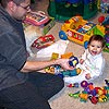 I just love playing on the floor with my Dad.<br><div class='photoDatesPopup'><br>from Emily's Photos taken 12/26/2005 and posted 1/1/2006</div>