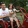 Move over Uncle Dale...I can drive a tractor too.<br><div class='photoDatesPopup'><br>from Emily's Photos taken 7/25/2007 and posted 8/21/2007</div>