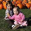 Hanging out with cousin Maggie at the apple orchard.<br><div class='photoDatesPopup'><br>from Emily's Photos taken 9/30/2007 and posted 10/27/2007</div>