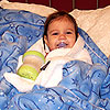 I am not spoiled.  After a bath I get wrapped up and watch Elmo and relax.<br><div class='photoDatesPopup'><br>from Emily's Photos taken 11/12/2006 and posted 12/5/2006</div>