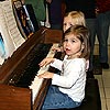 Rocking out with my Cousin Cami on the piano.<br><div class='photoDatesPopup'><br>from Emily's Photos taken 12/24/2007 and posted 1/18/2008</div>