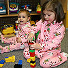 Playing in the crib room in our matching PJs.<br><div class='photoDatesPopup'><br>from Elise's Photos taken 12/21/2008 and posted 1/10/2009</div>