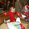 Lots of paper flying when Maggie and I were opening our gifts.<br><div class='photoDatesPopup'><br>from Elise's Photos taken 12/24/2009 and posted 1/2/2010</div>