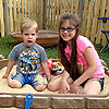 The sandbox is more fun with a sister.<br><div class='photoDatesPopup'><br>from Emerson's Photos taken 6/9/2014 and posted 1/24/2015</div>