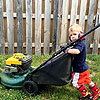 Dad is training Emerson young to mow the lawn.<br><div class='photoDatesPopup'><br>from Emerson's Photos taken 5/24/2015 and posted 8/1/2015</div>