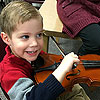 Having fun trying out all kinds of instruments at the middle school.<br><div class='photoDatesPopup'><br>from Emerson's Photos taken 12/5/2015 and posted 3/14/2016</div>