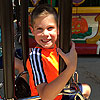 He was very excited to ride the swings and then didn't want to do them again.<br><div class='photoDatesPopup'><br>from Emerson's Photos taken 6/25/2019 and posted 7/31/2019</div>