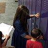 Working on figuring out her locker.<br><div class='photoDatesPopup'><br>from Elise's Photos taken 7/25/2019 and posted 7/31/2019</div>