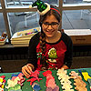 Elise was helping with crafts at the Musical Breakfast with Santa.<br><div class='photoDatesPopup'><br>from Elise's Photos taken 12/7/2019 and posted 8/26/2020</div>