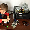 Learning to disassemble the computer.<br><div class='photoDatesPopup'><br>from Emerson's Photos taken 1/26/2020 and posted 8/26/2020</div>