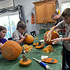 Hard at work pumpkin carvers.<br><div class='photoDatesPopup'><br>from Elise's Photos taken 10/24/2020 and posted 11/19/2020</div>