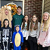 Halloween crew.  A couple stayed at the house to help hand out candy.<br><div class='photoDatesPopup'><br>from Elias' Photos taken 10/31/2021 and posted 2/22/2022</div>