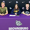 Friends came to support Emily signing to run for Marian University.<br><div class='photoDatesPopup'><br>from Emily's Photos taken 5/17/2023 and posted 1/30/2025</div>